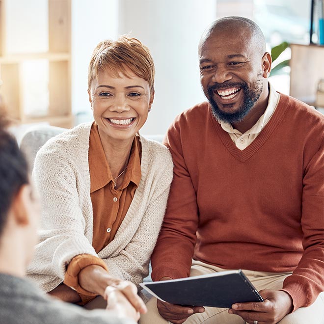 Couple consulting with a financial advisor